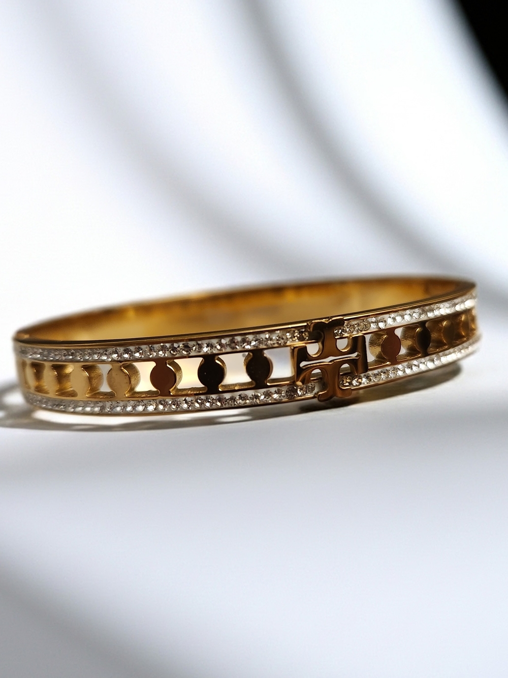 Tory Burch Gold Hinged Cutout Logo Bangle with Crystal Accents